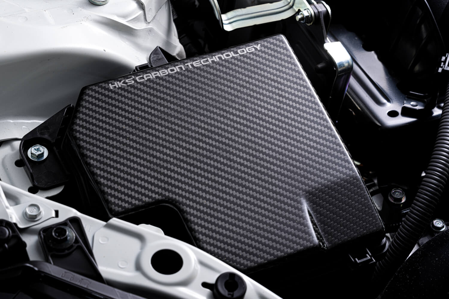 HKS Dry Carbon Fuse Box Cover – 2022+ Toyota GR86 / Subaru BRZ